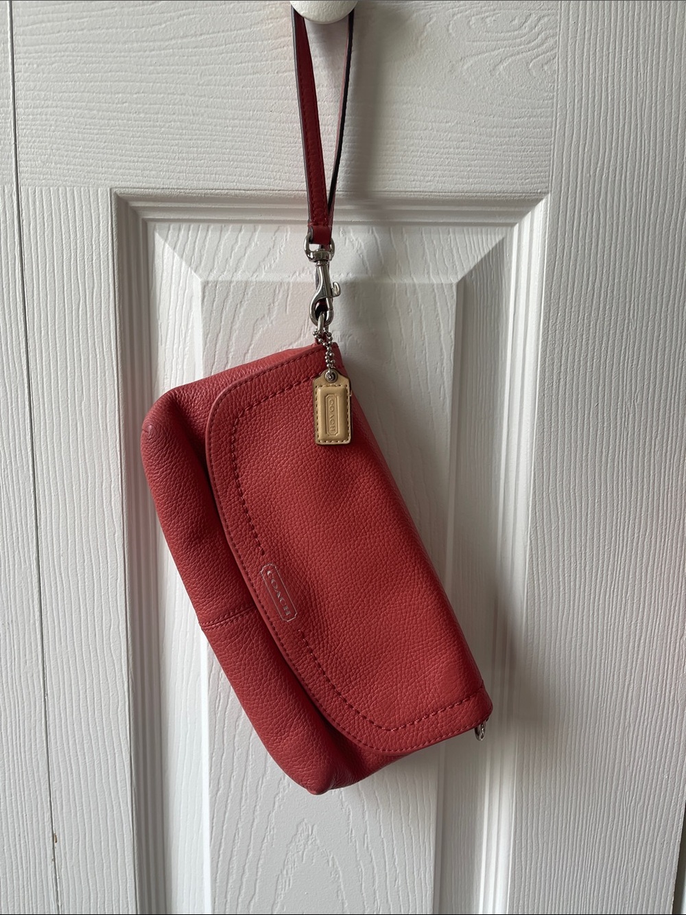 Coach Coral Red Pebbled Leather Wristlet with Gold Tag